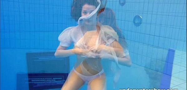  Cute Zuzanna is swimming nude in the pool